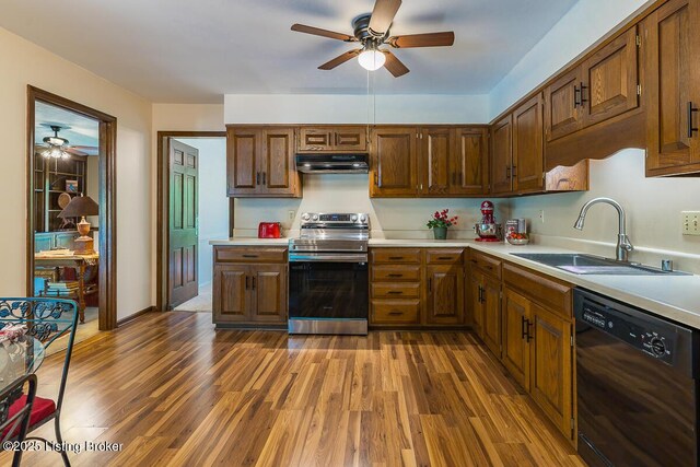 1824 Knollwood Rd, Louisville, KY 40207 - kitchen with black dishwasher, stainless steel range with electric cooktop, a ceiling fan, and under cabinet range hood