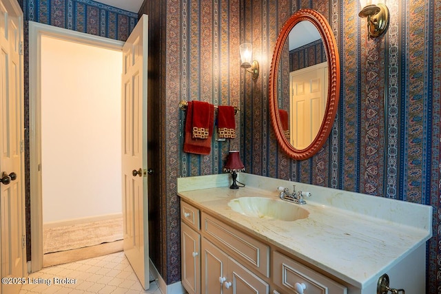 1824 Knollwood Rd, Louisville, KY 40207 - bathroom with wallpapered walls, vanity, and tile patterned flooring