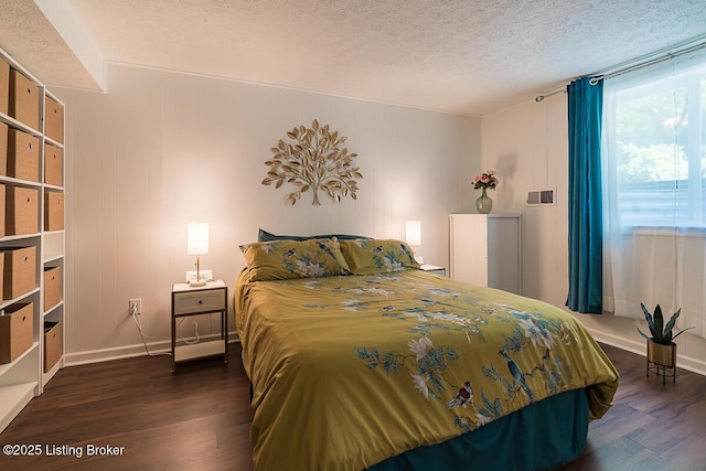 1824 Knollwood Rd, Louisville, KY 40207 - bedroom with dark wood-style floors and a textured ceiling
