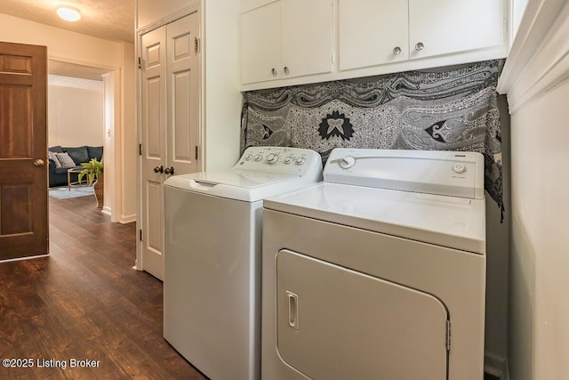 1824 Knollwood Rd, Louisville, KY 40207 - laundry area with cabinet space, washing machine and dryer, and dark wood-type flooring