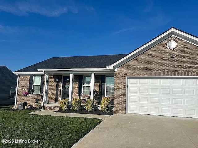 192 Patrum Sisters Way, Danville, KY 40422 - single story home with brick siding, concrete driveway, a front lawn, covered porch, and a garage