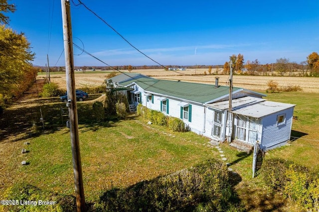 129 Henry Hathorne Ln, Rhodelia, KY 40161 - rear view of property with a yard and a metal roof