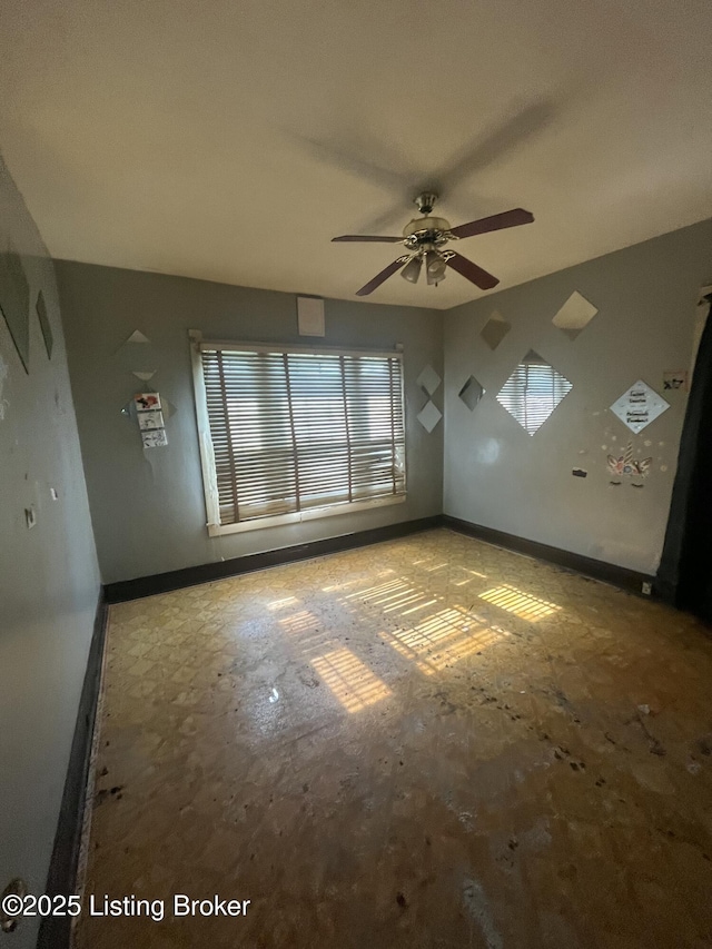 322 N 32nd St, Louisville, KY 40212 - unfurnished room featuring baseboards and a ceiling fan
