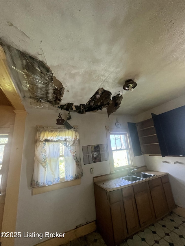 322 N 32nd St, Louisville, KY 40212 - kitchen with a sink and a textured ceiling