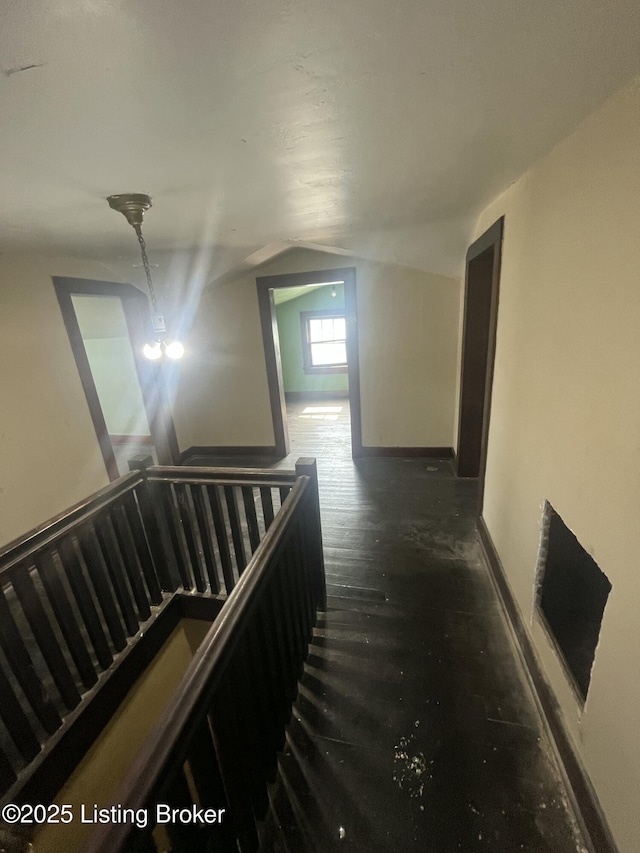 322 N 32nd St, Louisville, KY 40212 - hallway with dark wood finished floors and vaulted ceiling