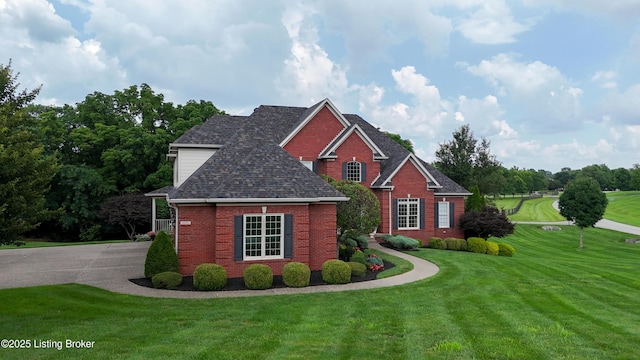 3221 Overlook Ridge Rd, Prospect, KY 40059 - traditional-style home featuring brick siding, a front yard, and roof with shingles