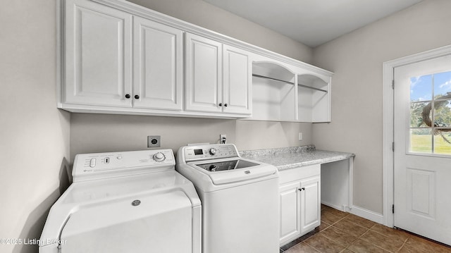 3221 Overlook Ridge Rd, Prospect, KY 40059 - washroom with cabinet space, washer and dryer, and dark tile patterned floors