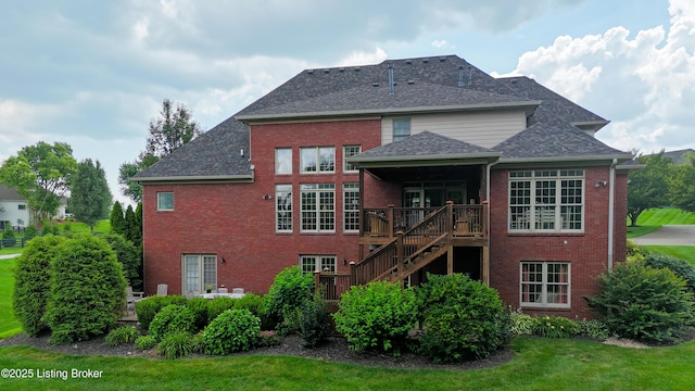 3221 Overlook Ridge Rd, Prospect, KY 40059 - rear view of property featuring brick siding, stairway, roof with shingles, and a deck