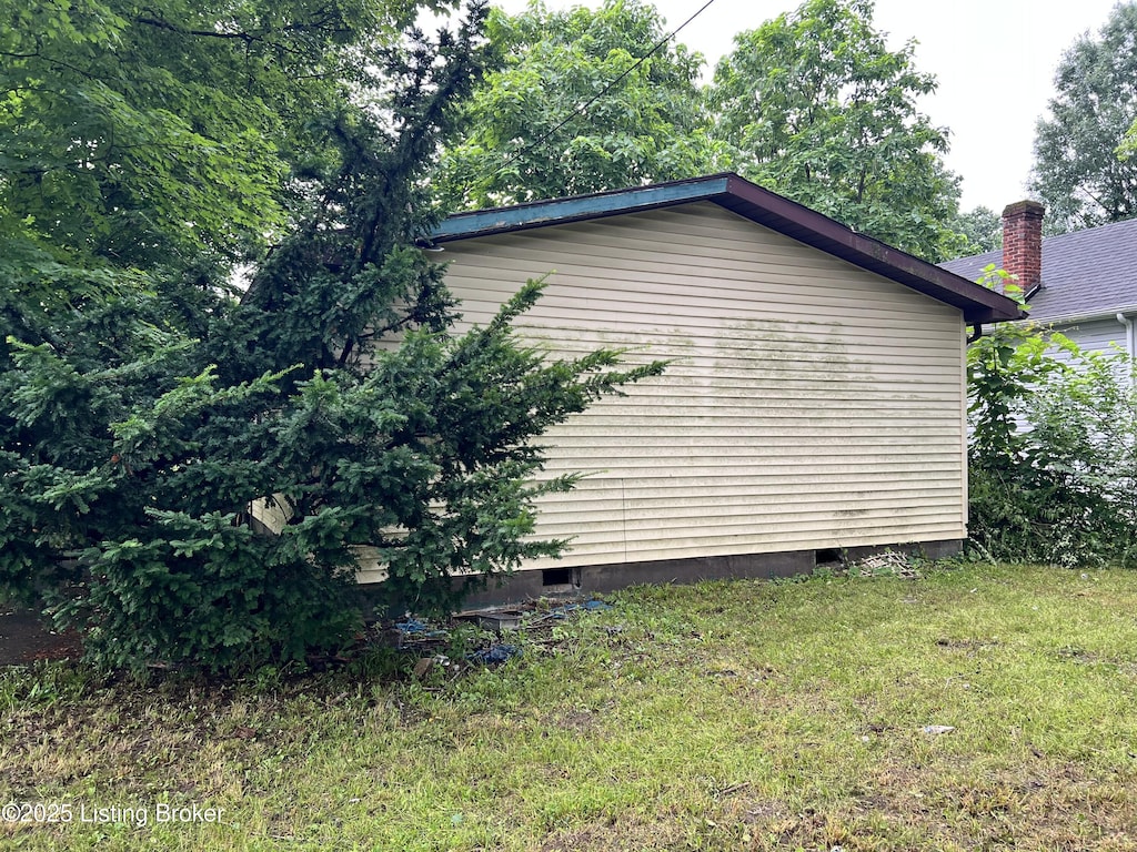 100 Boston Ct, Louisville, KY 40212 - view of home's exterior with crawl space and a yard
