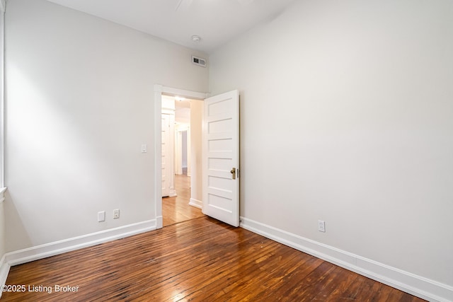 1629 S 3rd St Apt 102, Louisville, KY 40208 - spare room featuring hardwood / wood-style flooring and baseboards