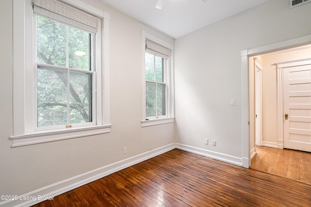 1629 S 3rd St Apt 102, Louisville, KY 40208 - unfurnished room featuring wood-type flooring