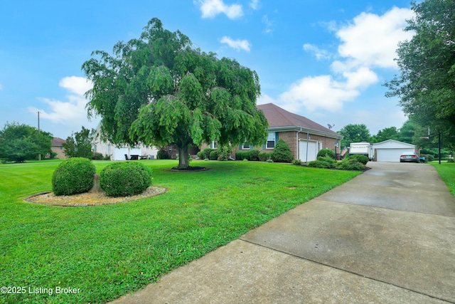 484 Meadowland Trl, Shepherdsville, KY 40165 - view of green lawn featuring a detached garage