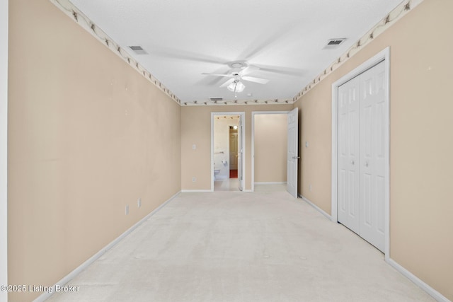 8001 Port Royal Ct, Louisville, KY 40291 - unfurnished bedroom with a ceiling fan, a closet, and light colored carpet