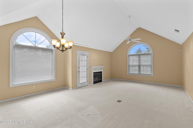 8001 Port Royal Ct, Louisville, KY 40291 - unfurnished living room featuring lofted ceiling, light carpet, a chandelier, a glass covered fireplace, and a ceiling fan