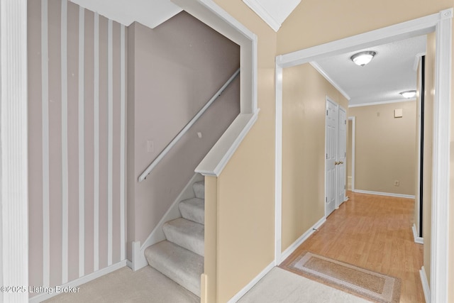 8001 Port Royal Ct, Louisville, KY 40291 - stairway with crown molding and wood finished floors