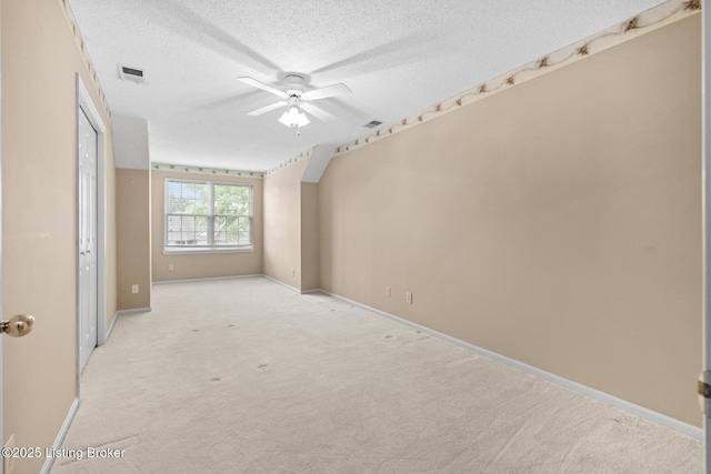 8001 Port Royal Ct, Louisville, KY 40291 - unfurnished room featuring a textured ceiling, a ceiling fan, and light carpet