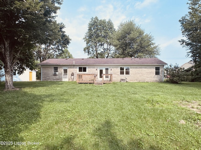 5019 S Wilson Rd, Elizabethtown, KY 42701 - back of property featuring a deck, a yard, and stone siding