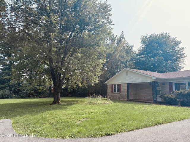 5019 S Wilson Rd, Elizabethtown, KY 42701 - view of home's exterior with a yard