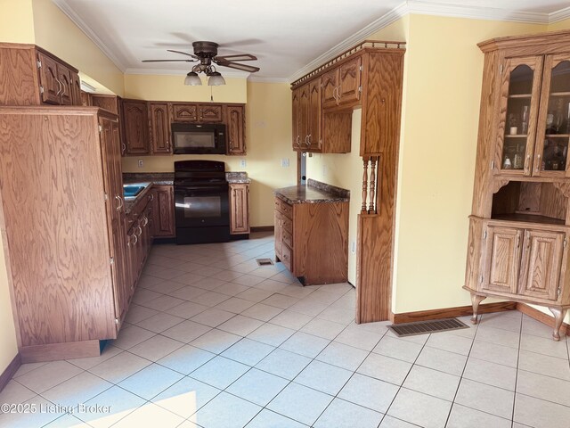 5019 S Wilson Rd, Elizabethtown, KY 42701 - kitchen featuring black appliances, a ceiling fan, crown molding, light tile patterned floors, and glass insert cabinets