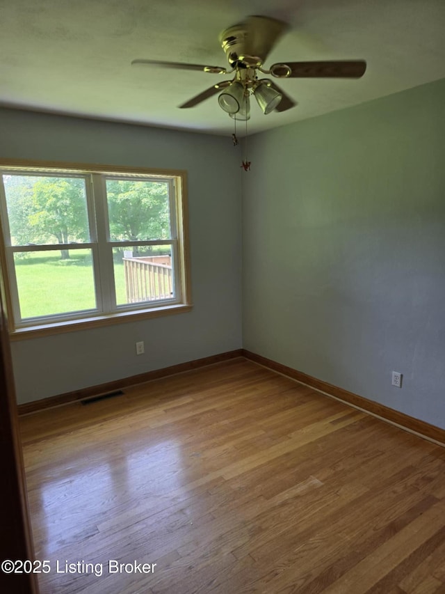 5019 S Wilson Rd, Elizabethtown, KY 42701 - empty room featuring wood finished floors and ceiling fan
