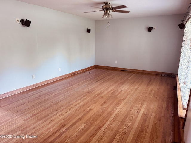 5019 S Wilson Rd, Elizabethtown, KY 42701 - empty room featuring light wood finished floors and ceiling fan