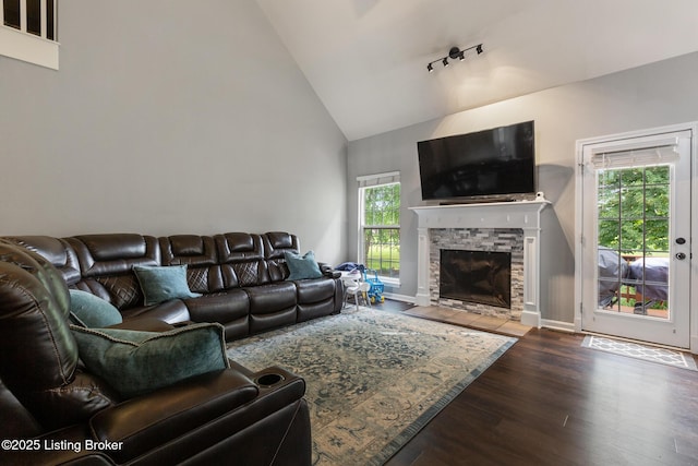 3506 Coventry Tee Ct, Louisville, KY 40241 - living area with high vaulted ceiling, wood finished floors, a fireplace, and healthy amount of natural light