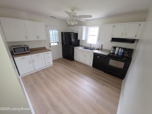 8308 Lake Superior Dr, Louisville, KY 40291 - kitchen with black appliances, under cabinet range hood, white cabinetry, a ceiling fan, and light wood finished floors