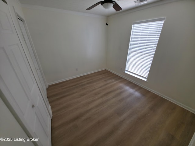 8308 Lake Superior Dr, Louisville, KY 40291 - unfurnished room with wood finished floors, a ceiling fan, and ornamental molding