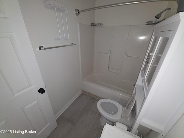 8308 Lake Superior Dr, Louisville, KY 40291 - bathroom featuring toilet and bathtub / shower combination