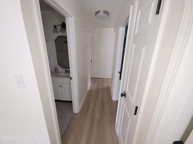 8308 Lake Superior Dr, Louisville, KY 40291 - hall featuring light wood-style floors and a sink