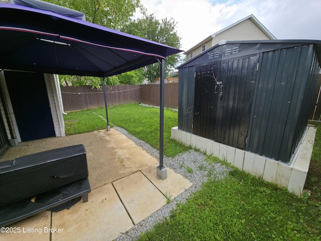 8308 Lake Superior Dr, Louisville, KY 40291 - fenced backyard featuring a storage unit and a patio