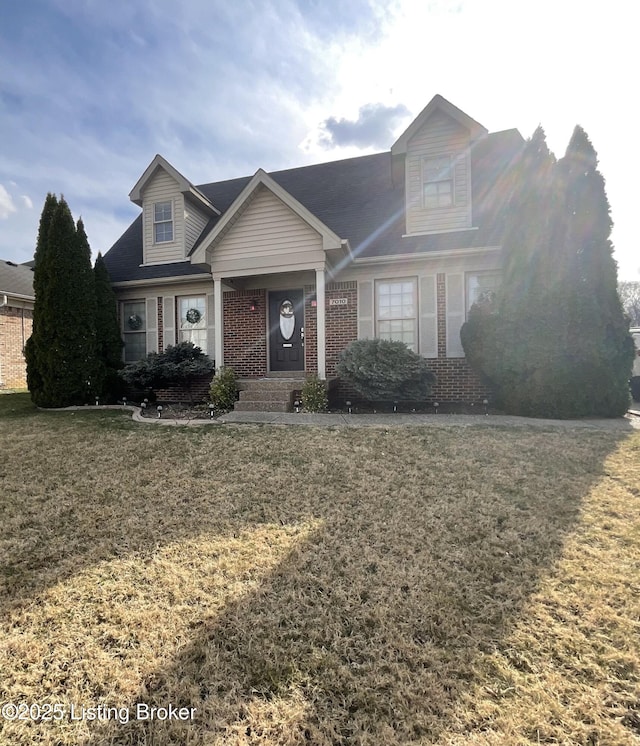 7010 Train Station Way, Louisville, KY 40272 - view of front of home featuring brick siding and a front lawn