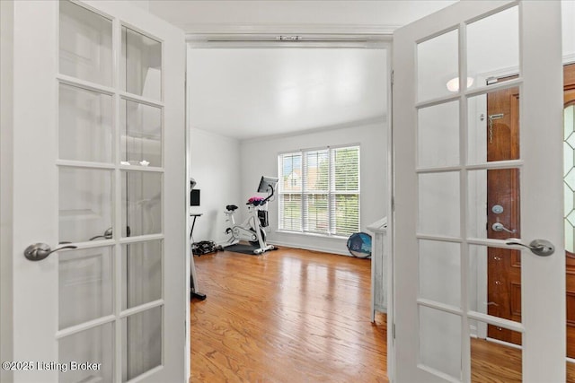 9311 Artis Way, Louisville, KY 40291 - exercise room featuring wood finished floors, french doors, and ornamental molding