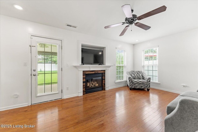 9311 Artis Way, Louisville, KY 40291 - living area featuring hardwood / wood-style flooring, a glass covered fireplace, recessed lighting, and a ceiling fan