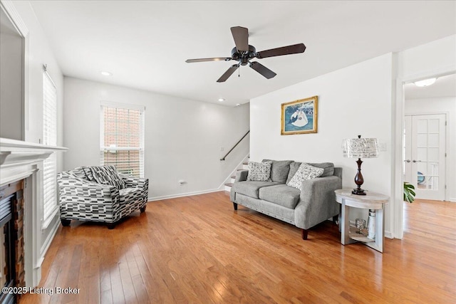 9311 Artis Way, Louisville, KY 40291 - living area with stairway, hardwood / wood-style flooring, a fireplace, ceiling fan, and recessed lighting