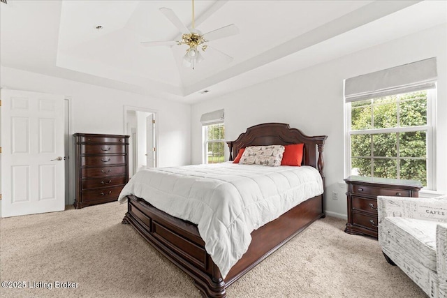 9311 Artis Way, Louisville, KY 40291 - bedroom featuring light colored carpet, a tray ceiling, and ceiling fan