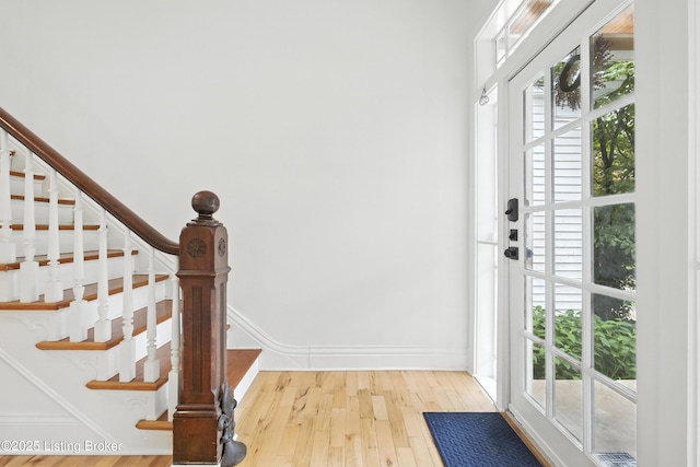 143 State St, Louisville, KY 40206 - doorway featuring plenty of natural light, wood finished floors, and stairs