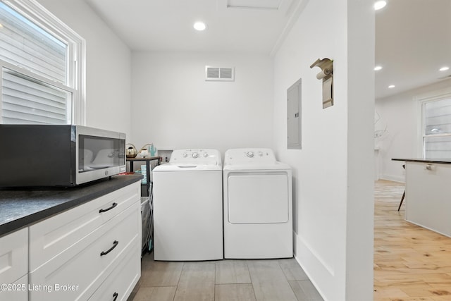143 State St, Louisville, KY 40206 - laundry room with electric panel, independent washer and dryer, light wood-style floors, and recessed lighting