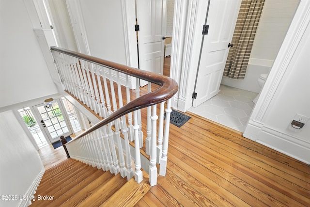 143 State St, Louisville, KY 40206 - stairs with wood finished floors and a high ceiling