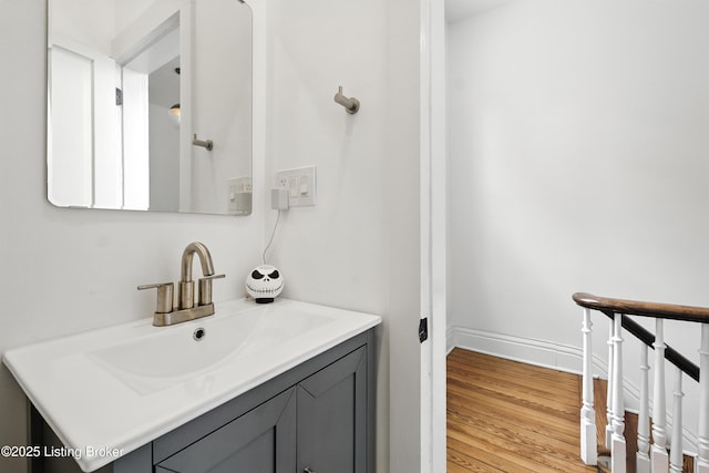 143 State St, Louisville, KY 40206 - bathroom featuring vanity and wood finished floors