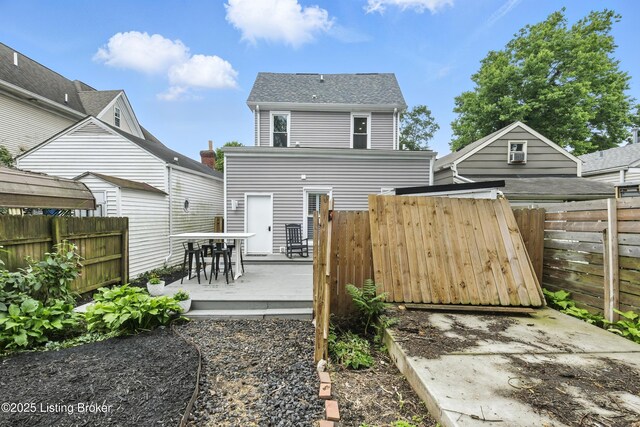 143 State St, Louisville, KY 40206 - back of house featuring roof with shingles