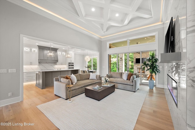 6511 Rosecliff Ct, Prospect, KY 40059 - living area with a high ceiling, recessed lighting, coffered ceiling, ornamental molding, and light wood-style flooring