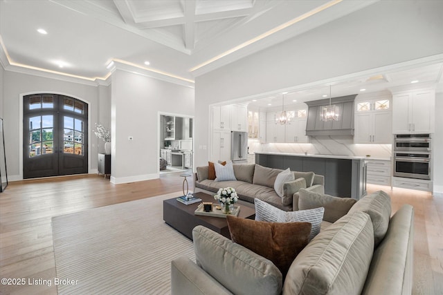 6511 Rosecliff Ct, Prospect, KY 40059 - living area featuring crown molding, a chandelier, light wood-style flooring, recessed lighting, and a high ceiling