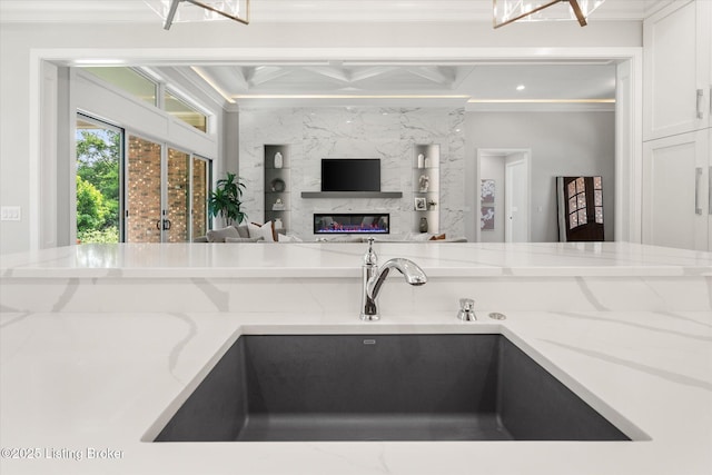 6511 Rosecliff Ct, Prospect, KY 40059 - kitchen featuring ornamental molding, light stone counters, a premium fireplace, white cabinetry, and recessed lighting