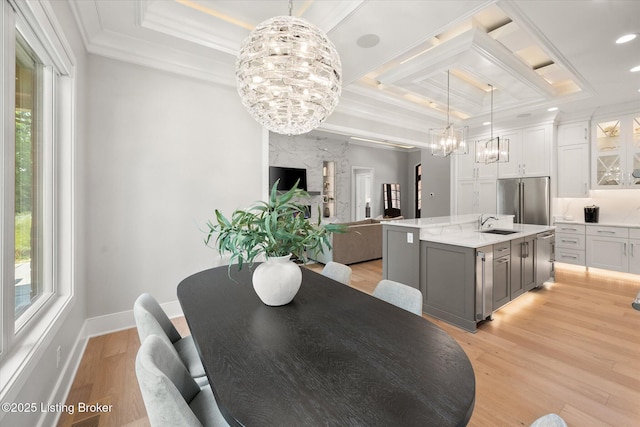 6511 Rosecliff Ct, Prospect, KY 40059 - dining room with a chandelier, crown molding, a tray ceiling, light wood finished floors, and coffered ceiling