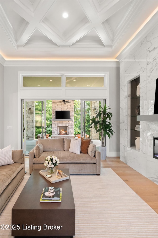 6511 Rosecliff Ct, Prospect, KY 40059 - living area featuring a high end fireplace, coffered ceiling, plenty of natural light, crown molding, and wood finished floors