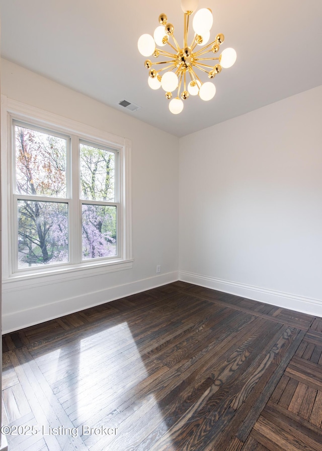 1293 Everett Ave, Louisville, KY 40204 - spare room featuring a chandelier and baseboards