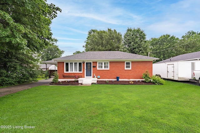 8433 Chase Rd, Louisville, KY 40258 - ranch-style house featuring brick siding, a front yard, and driveway