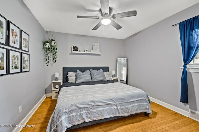 8433 Chase Rd, Louisville, KY 40258 - bedroom with wood finished floors and a ceiling fan