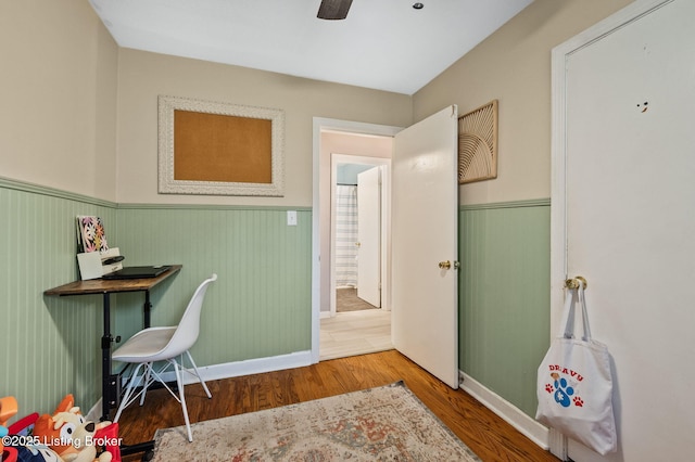 8433 Chase Rd, Louisville, KY 40258 - office area with a wainscoted wall, wood finished floors, and ceiling fan